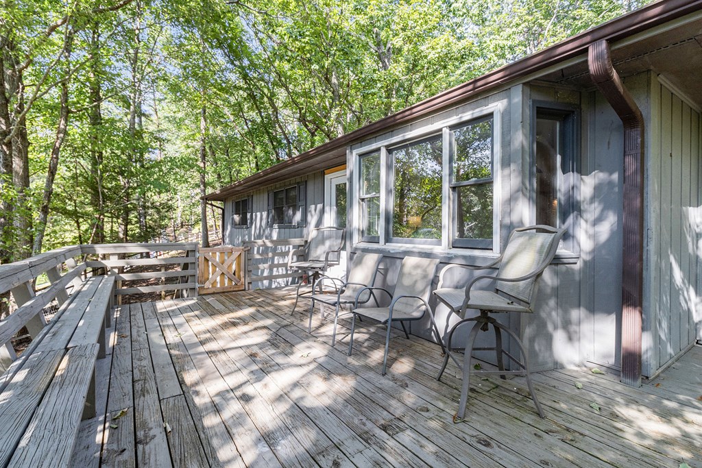 220 Fox Den Circle Jasper, GA 30143 - Photo 21 of 29 a view of backyard with outdoor seating and wooden floor