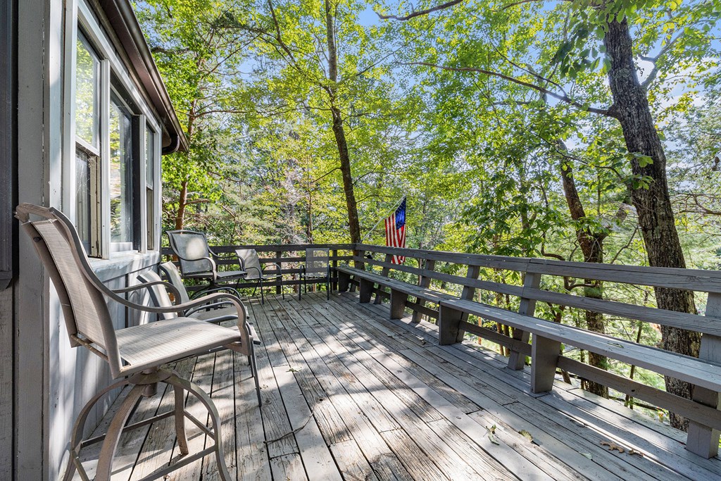 220 Fox Den Circle Jasper, GA 30143 - Photo 22 of 29 a view of balcony with chairs and wooden fence