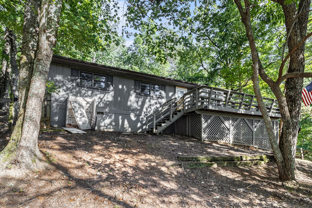 220 Fox Den Circle Jasper, GA 30143 - Photo 26 of 29 a view of backyard with a large tree