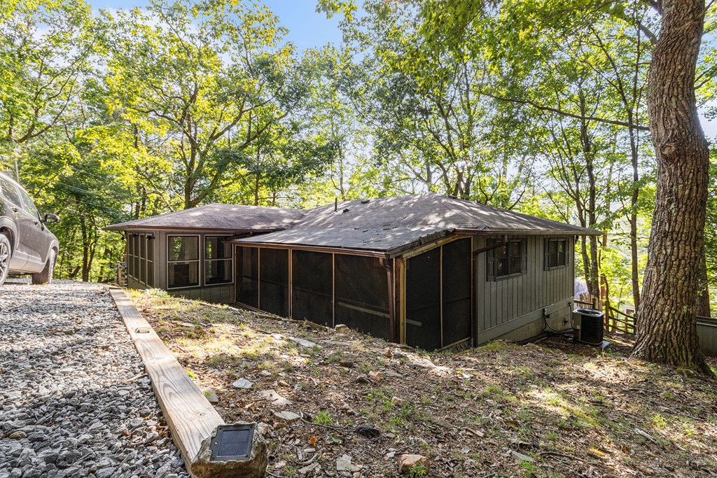 220 Fox Den Circle Jasper, GA 30143 - Photo 27 of 29 a house with a tree in the background