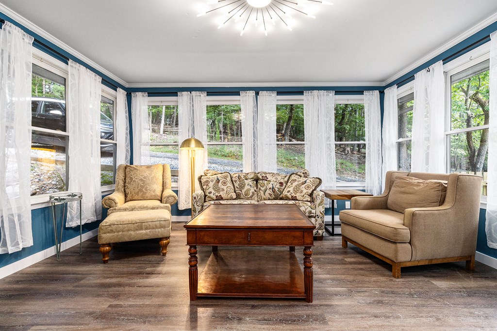 220 Fox Den Circle Jasper, GA 30143 - Photo 4 of 29 a living room with furniture and a large window
