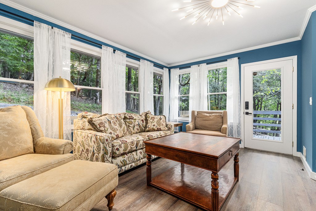220 Fox Den Circle Jasper, GA 30143 - Photo 5 of 29 a living room with furniture and a large window