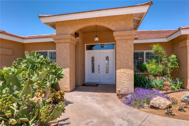 a bedroom with furniture and a fireplace
