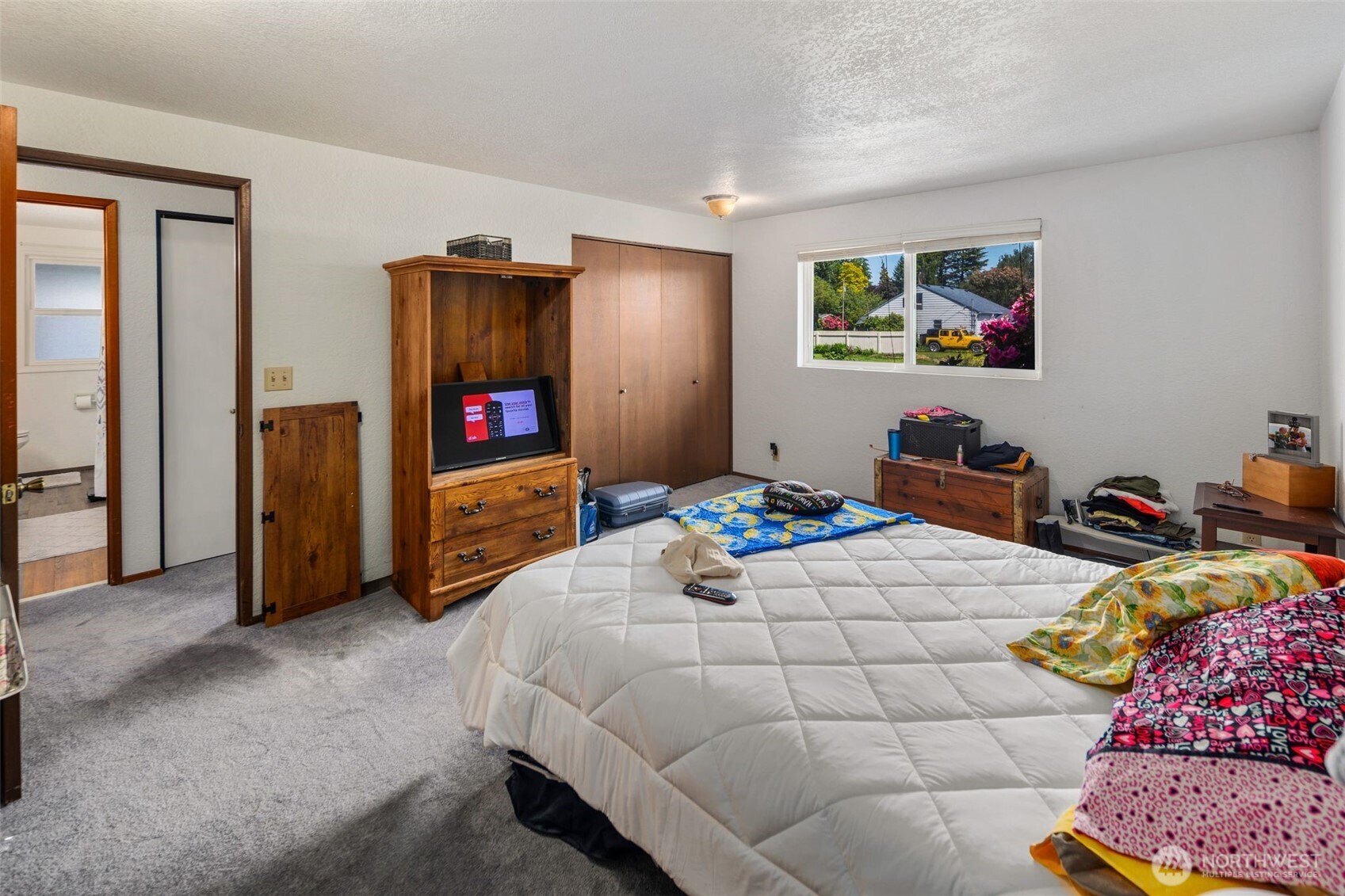 17464 Dunbar Road, Unit 1 Mount Vernon, WA 98273 - Photo 17 of 40 a bedroom with a bed and a view of bedroom