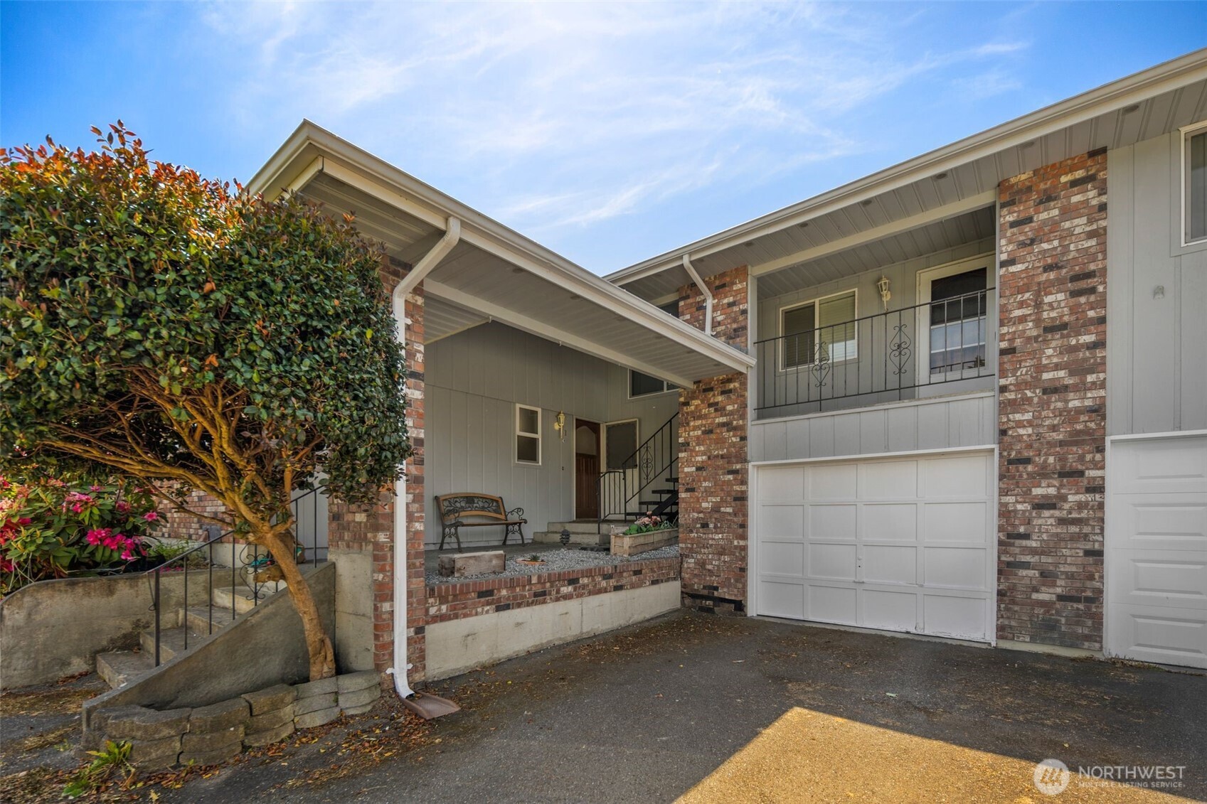 17464 Dunbar Road, Unit 1 Mount Vernon, WA 98273 - Photo 2 of 40 a front view of a house with a garage