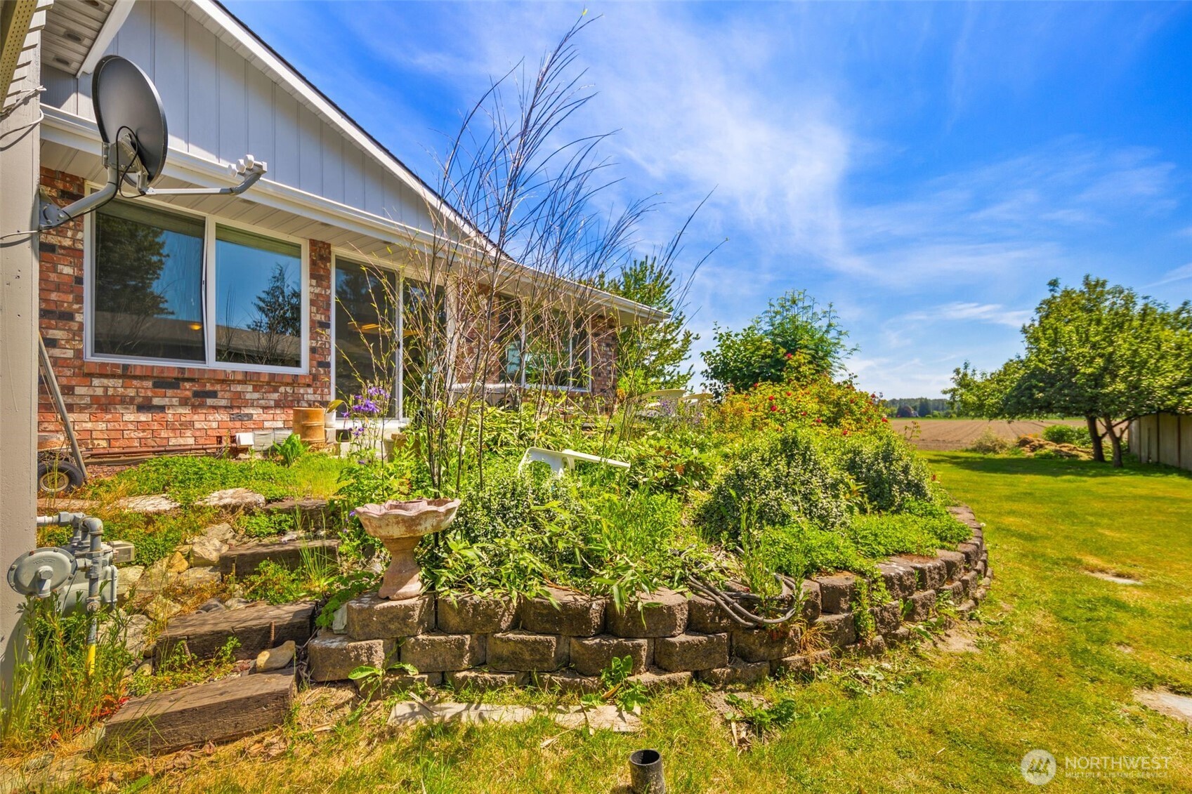 17464 Dunbar Road, Unit 1 Mount Vernon, WA 98273 - Photo 37 of 40 a view of a house with a yard