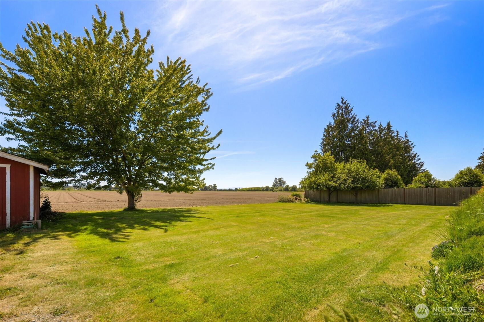 17464 Dunbar Road, Unit 1 Mount Vernon, WA 98273 - Photo 40 of 40 a view of yard with swimming pool and green space