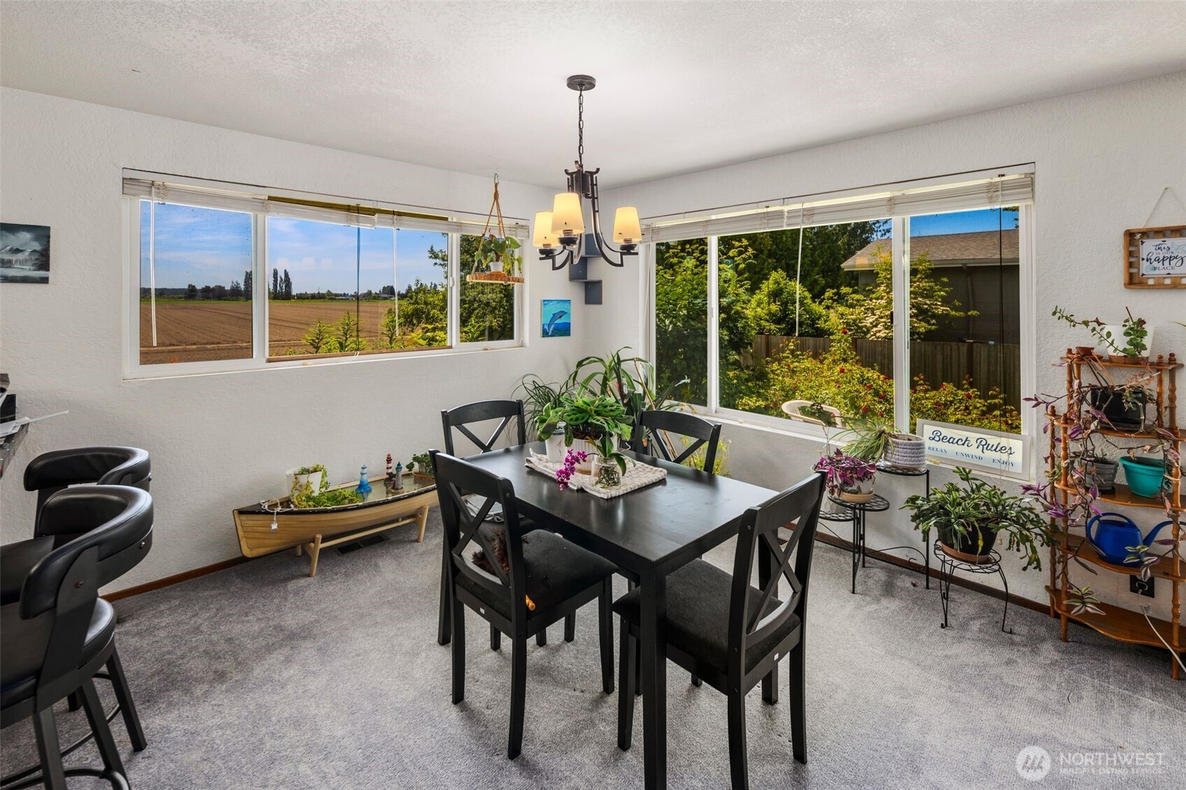 17464 Dunbar Road, Unit 1 Mount Vernon, WA 98273 - Photo 9 of 40 a view of a dining room with furniture window and outside view