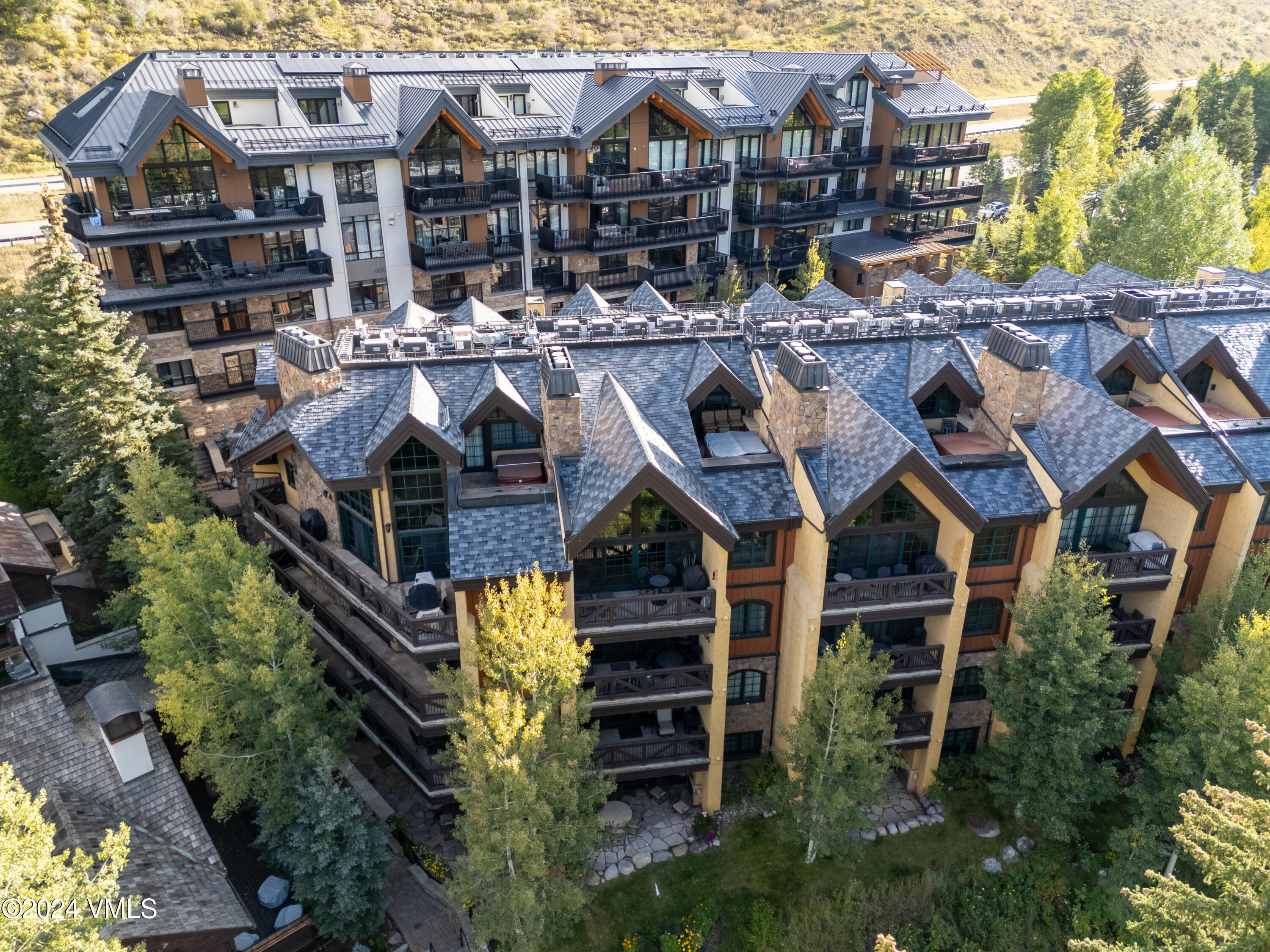 434 South Frontage Road East, Unit 402 Vail, CO 81657 - Photo 28 of 44 a picture of houses with outdoor space