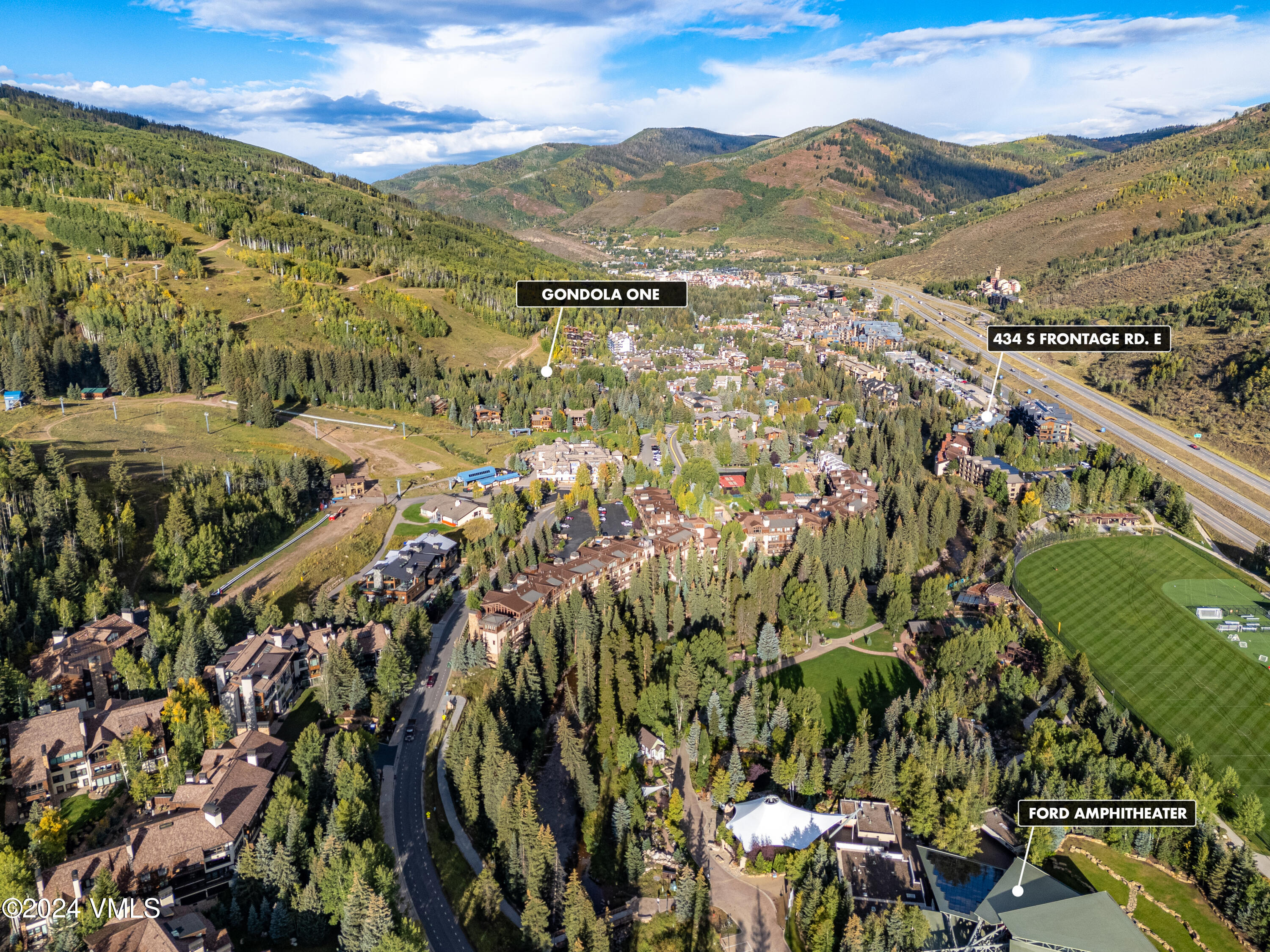 434 South Frontage Road East, Unit 402 Vail, CO 81657 - Photo 3 of 44 a view of a city with mountains in the background
