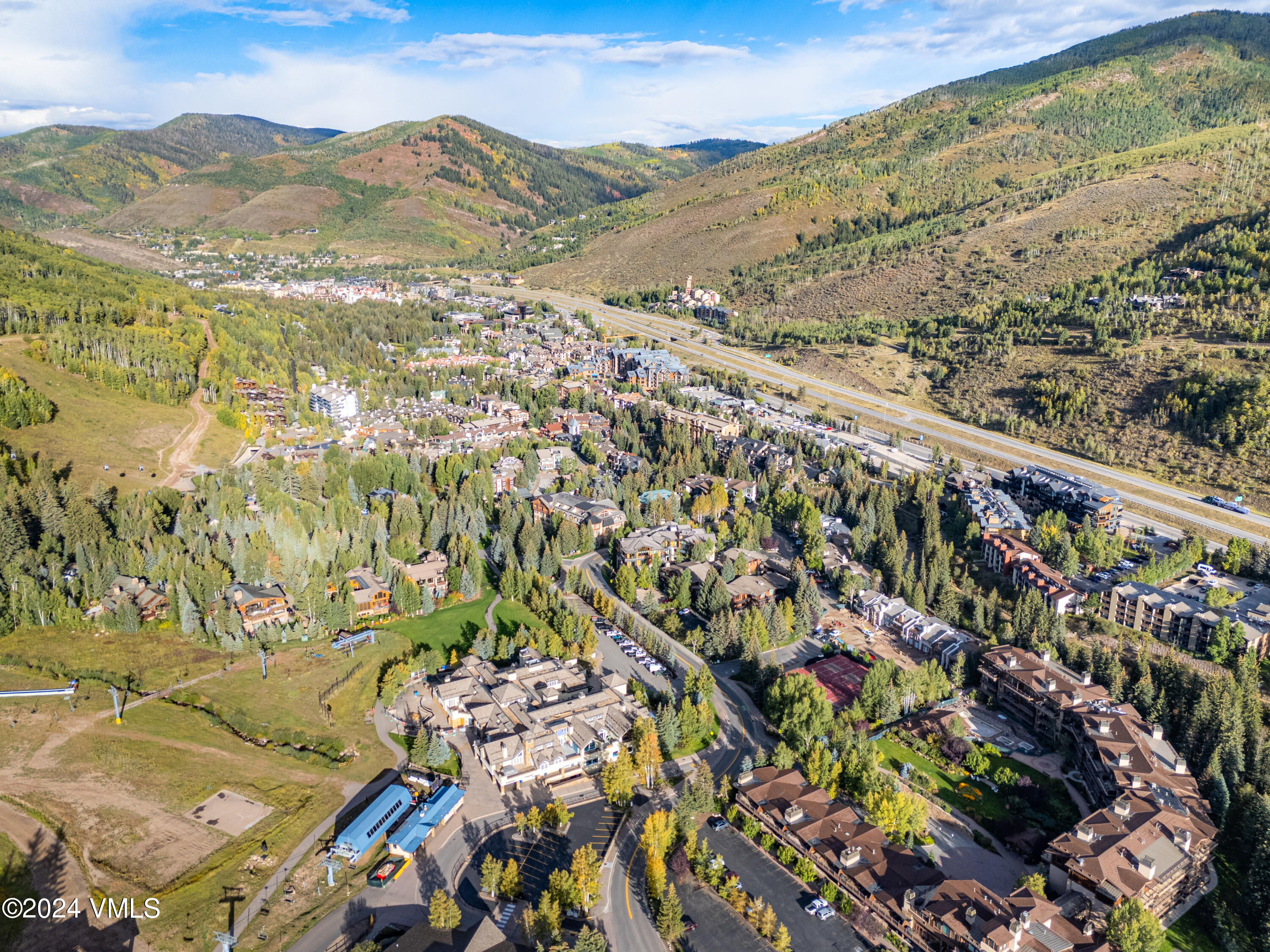 434 South Frontage Road East, Unit 402 Vail, CO 81657 - Photo 42 of 44 a view of a city with mountains in the background