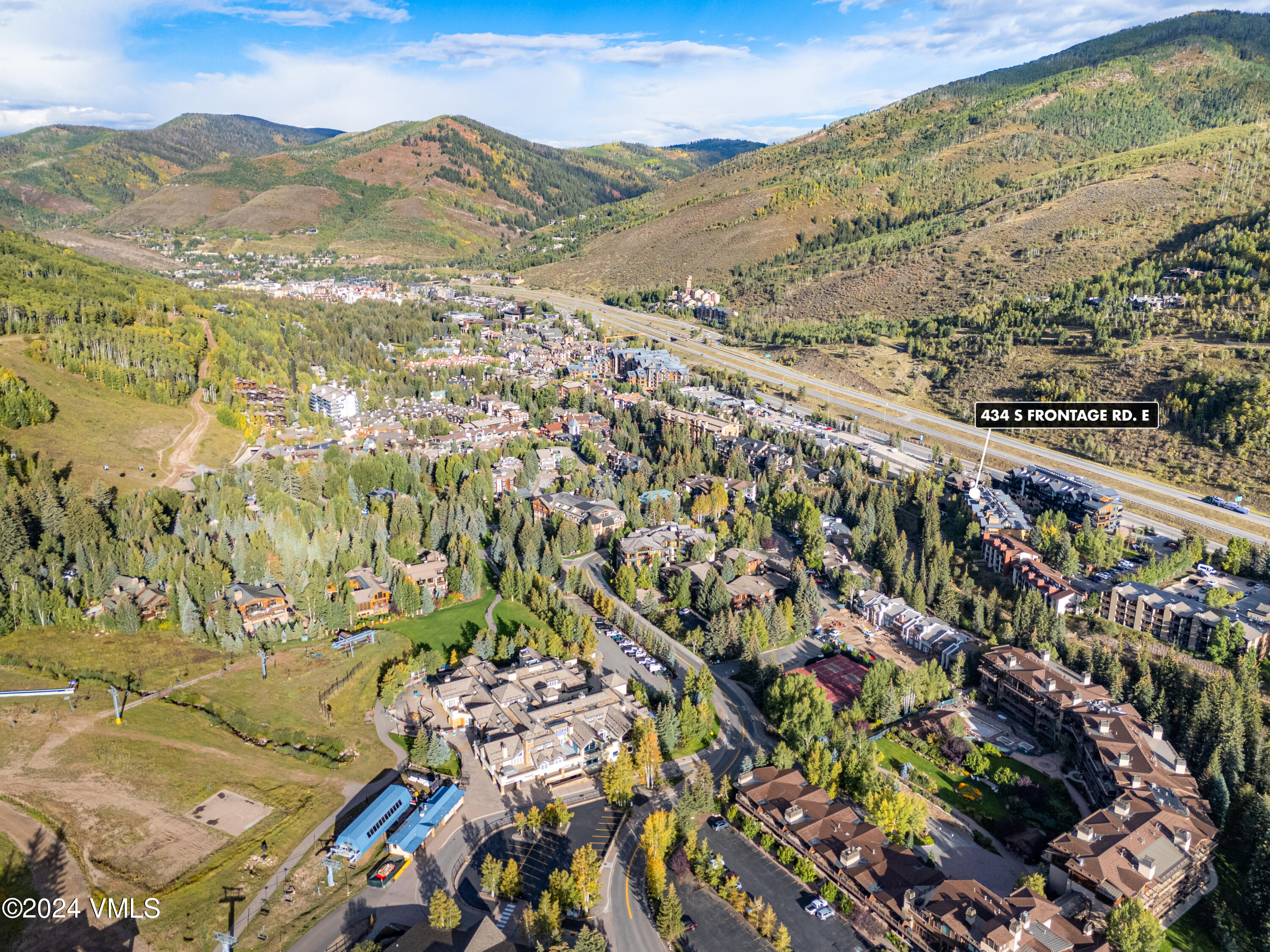 434 South Frontage Road East, Unit 402 Vail, CO 81657 - Photo 43 of 44 a view of a city with mountains in the background