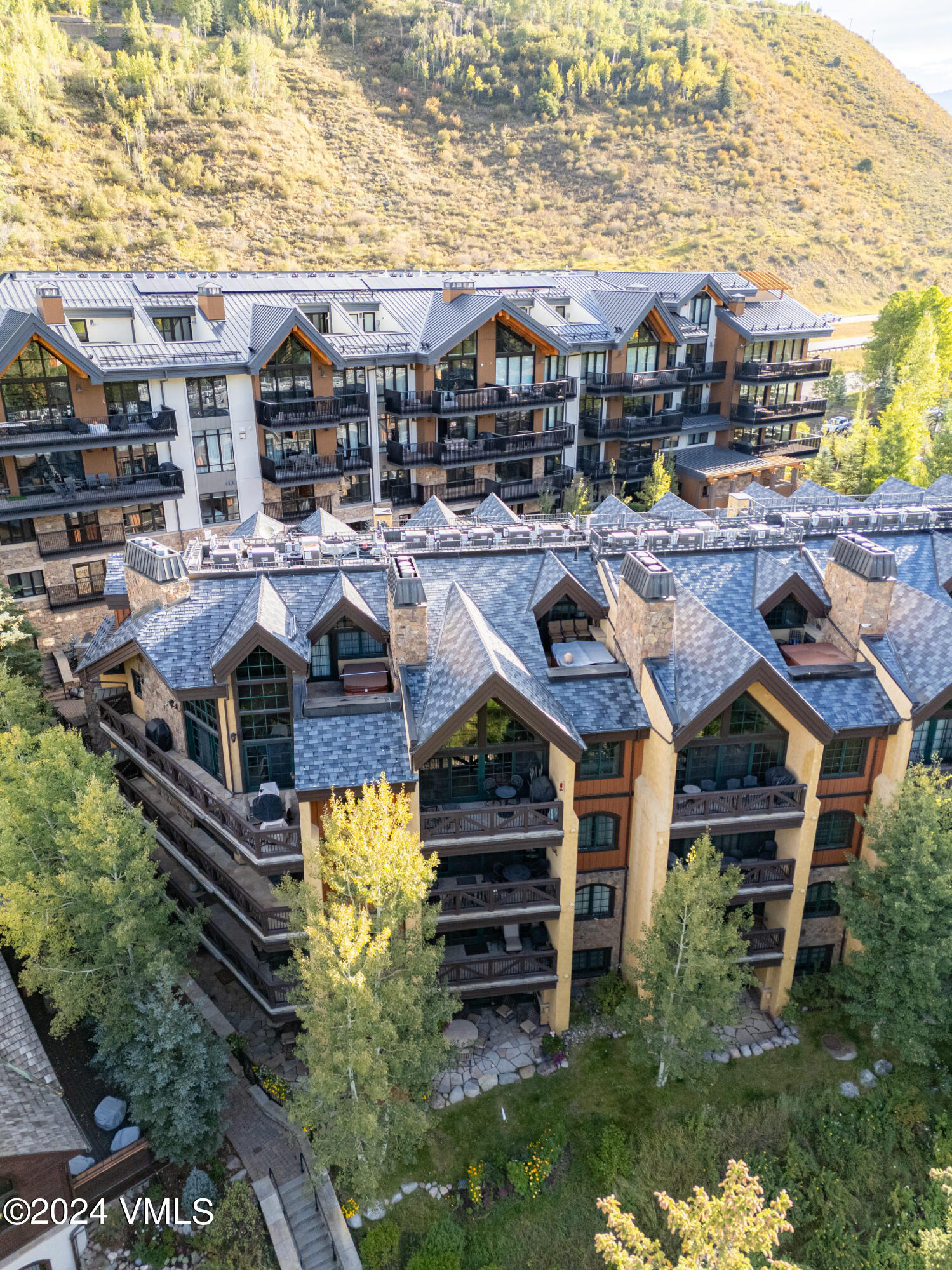 434 South Frontage Road East, Unit 402 Vail, CO 81657 - Photo 44 of 44 a aerial view of a house with a yard sitting space and swimming pool