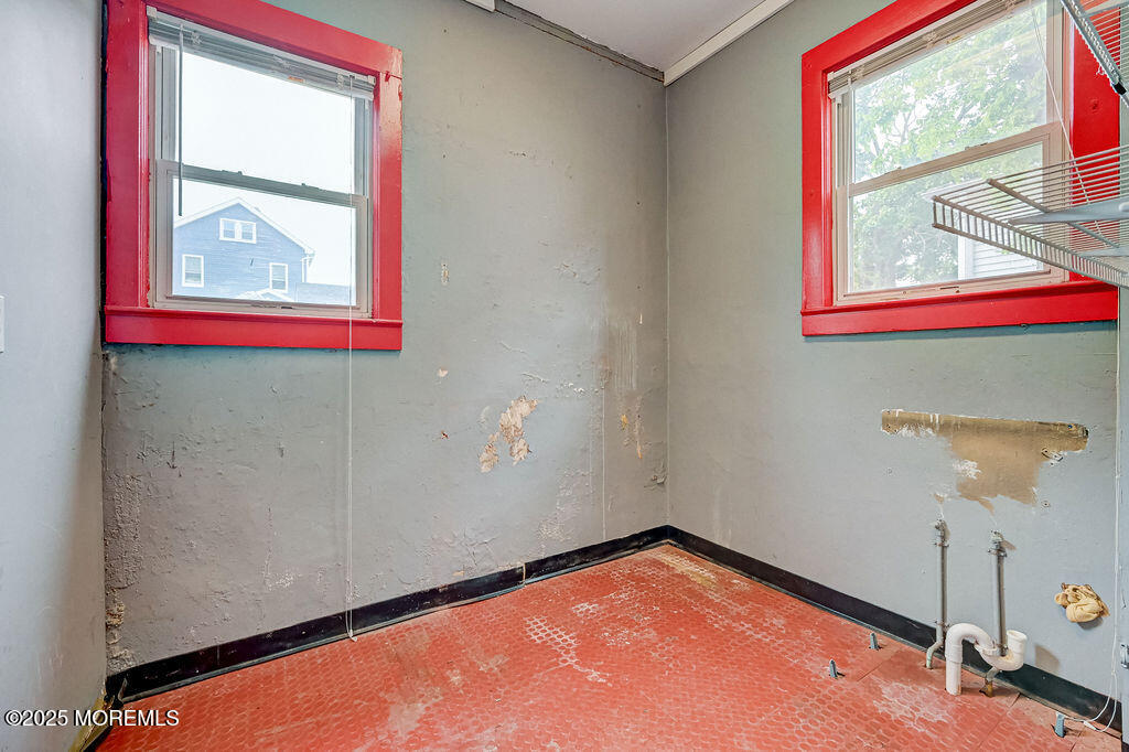 95 Broadway Keyport, NJ 07735 - Photo 11 of 31 a view of a small space with wooden floor and a window