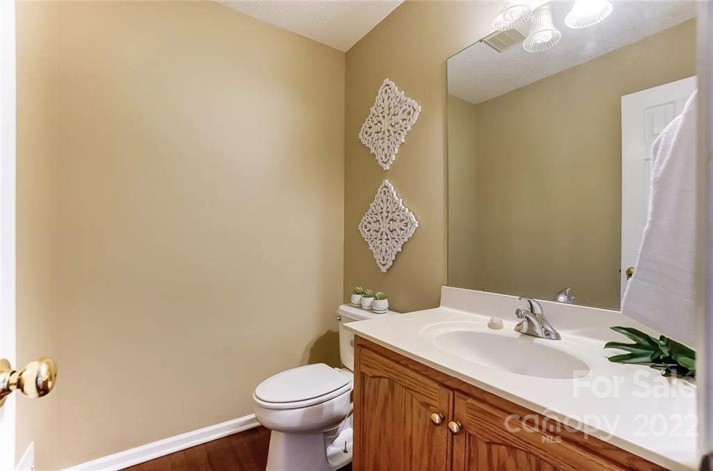 104 High Ridge Court West Mount Holly, NC 28120 - Photo 13 of 34 a bathroom with a sink and a toilet