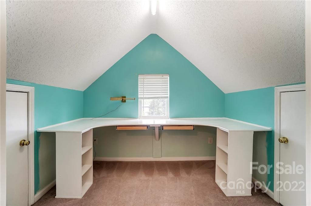 104 High Ridge Court West Mount Holly, NC 28120 - Photo 19 of 34 a room with window and stairs