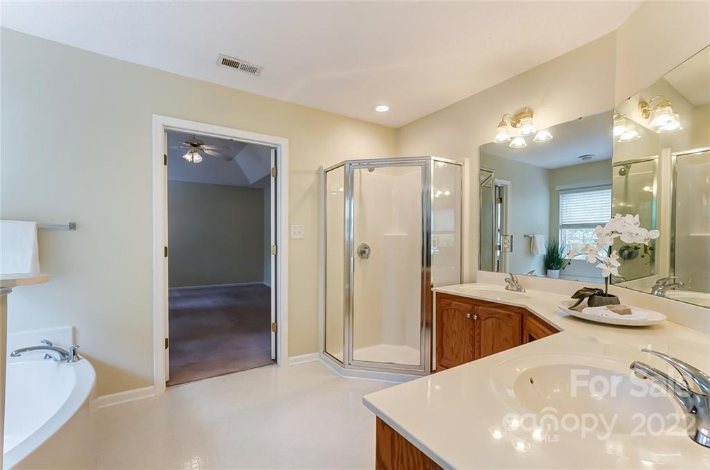 104 High Ridge Court West Mount Holly, NC 28120 - Photo 25 of 34 a large white kitchen with a tub and shower