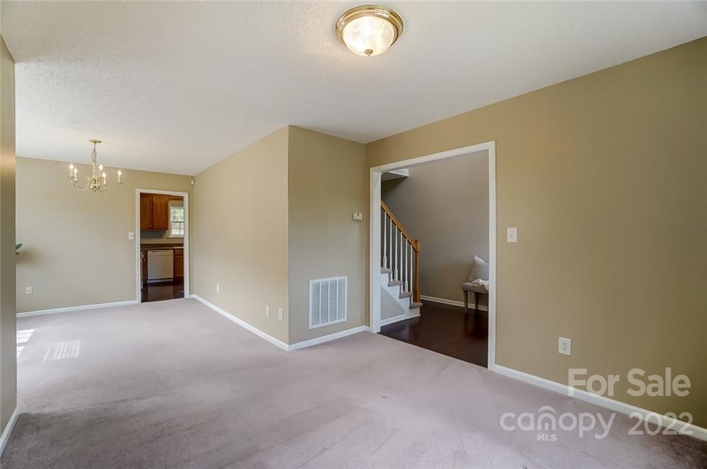 104 High Ridge Court West Mount Holly, NC 28120 - Photo 3 of 34 a view of empty room with a fireplace