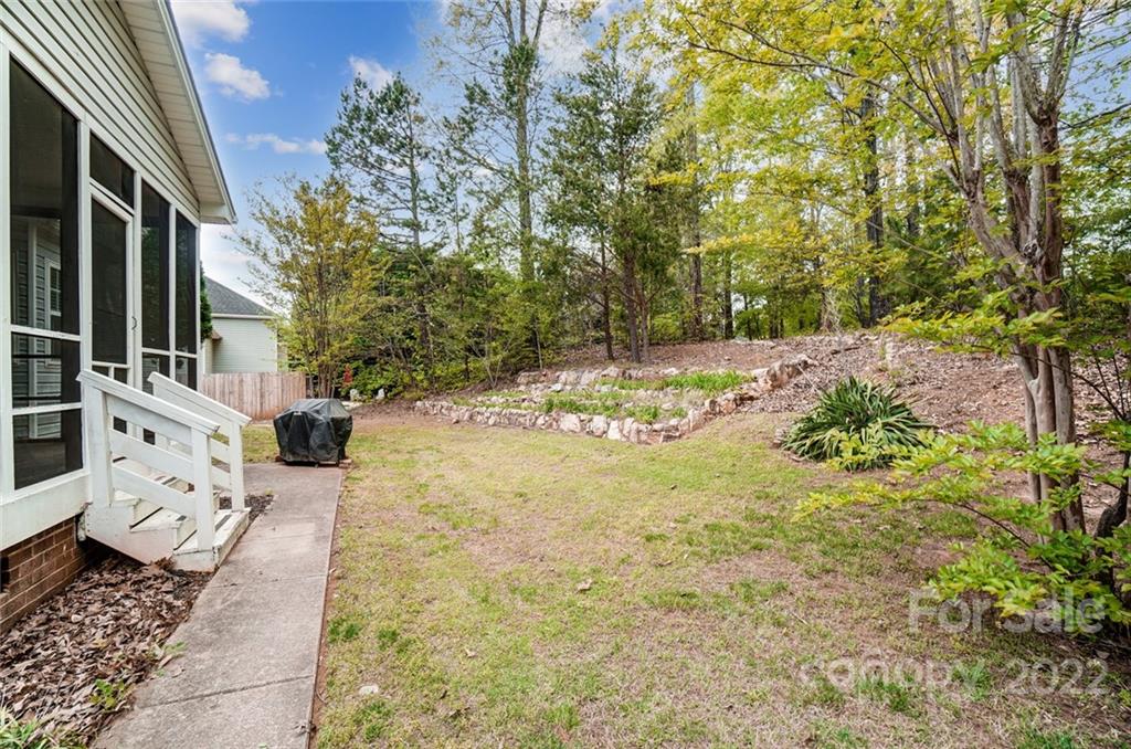 104 High Ridge Court West Mount Holly, NC 28120 - Photo 33 of 34 a view of a yard with plants