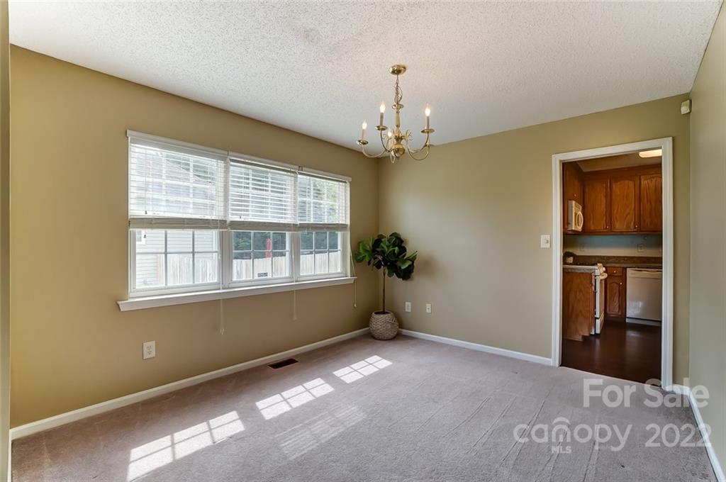 104 High Ridge Court West Mount Holly, NC 28120 - Photo 4 of 34 a view of an empty room with a window