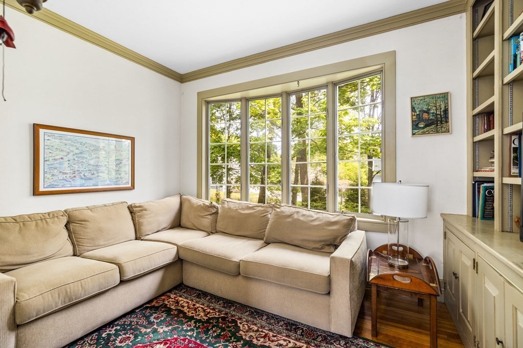 59 Cottage Street Hingham, MA 02043 - Photo 11 of 28 a living room with furniture and a window