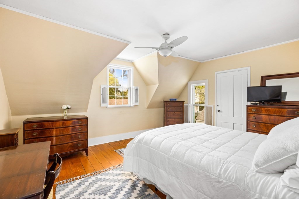 59 Cottage Street Hingham, MA 02043 - Photo 14 of 28 a bedroom with a bed and a television