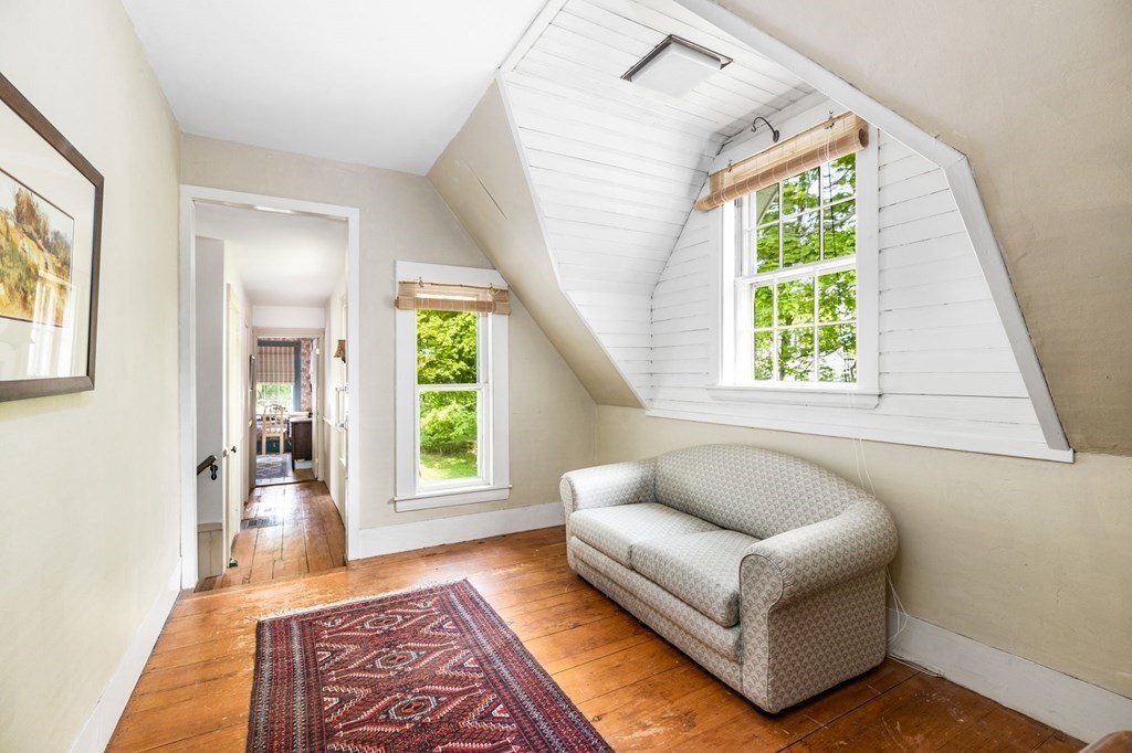 59 Cottage Street Hingham, MA 02043 - Photo 18 of 28 a living room with furniture and a window