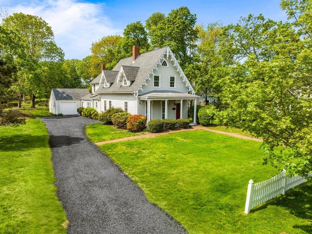 59 Cottage Street Hingham, MA 02043 - Photo 21 of 28 a front view of a house with yard and green space
