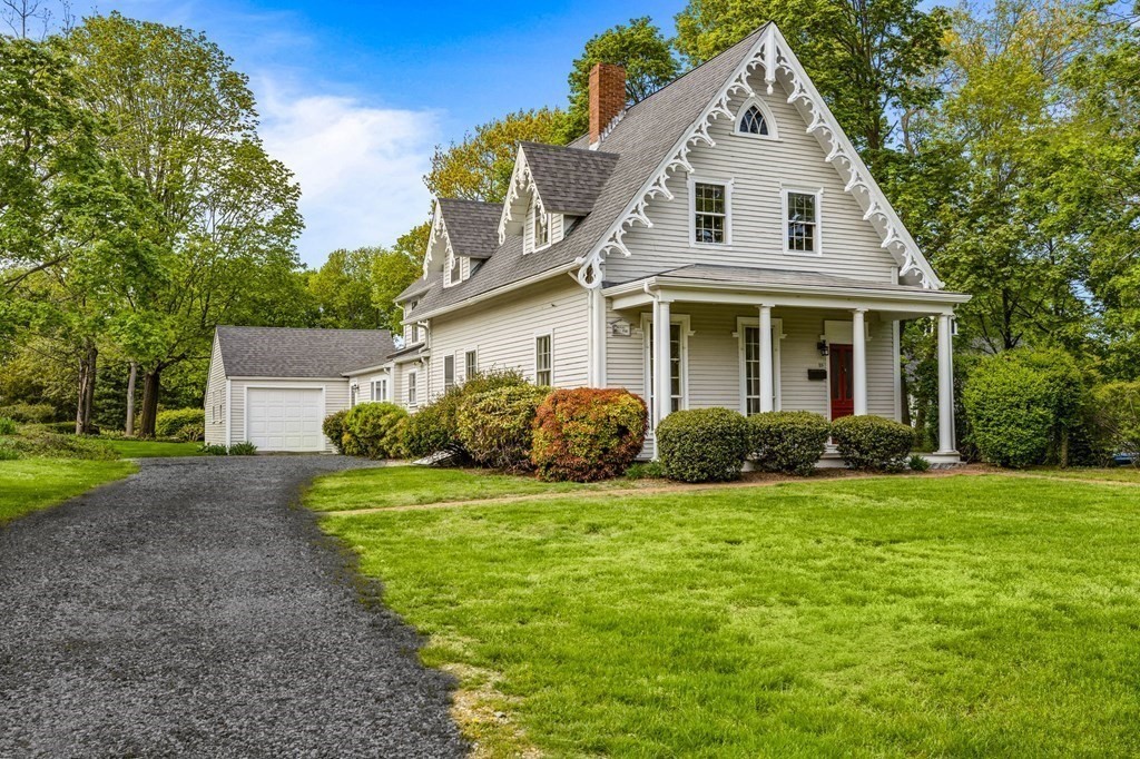 59 Cottage Street Hingham, MA 02043 - Photo 22 of 28 a front view of a house with a yard