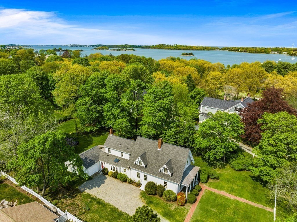 59 Cottage Street Hingham, MA 02043 - Photo 28 of 28 an aerial view of residential houses with outdoor space and trees