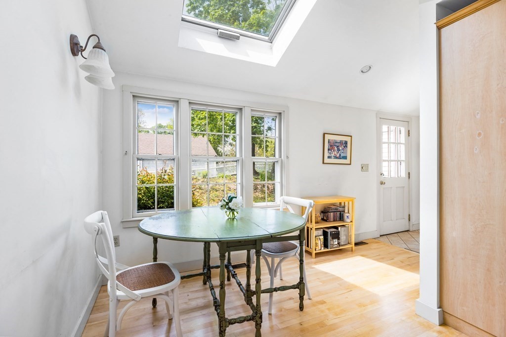 59 Cottage Street Hingham, MA 02043 - Photo 3 of 28 a view of a dining room with furniture and a window