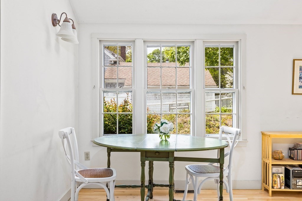 59 Cottage Street Hingham, MA 02043 - Photo 4 of 28 a view of a dining room with furniture window and outside view