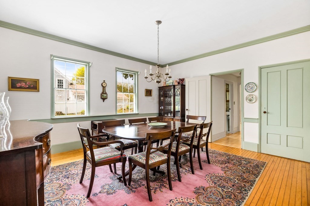 59 Cottage Street Hingham, MA 02043 - Photo 7 of 28 a view of a dining room with furniture window and wooden floor