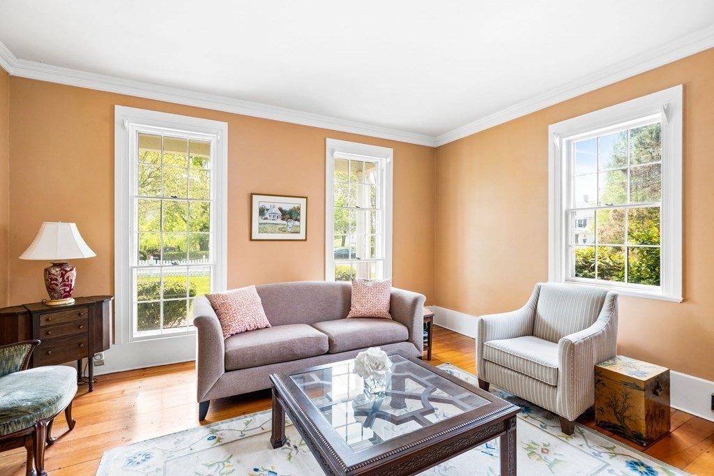 59 Cottage Street Hingham, MA 02043 - Photo 9 of 28 a living room with furniture and a large window