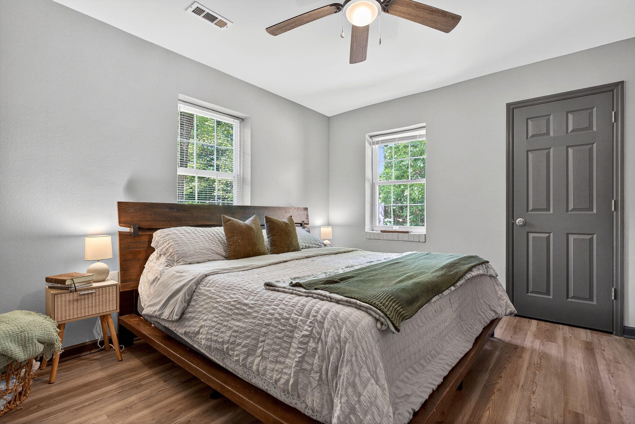 9388 Harrison Ferry Road McMinnville, TN 37110 - Photo 24 of 41 a bed sitting in a bedroom next to a window