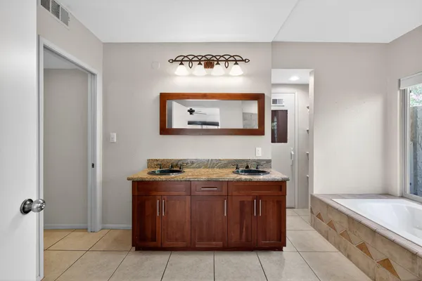 a bathroom with a sink a toilet and a bathtub