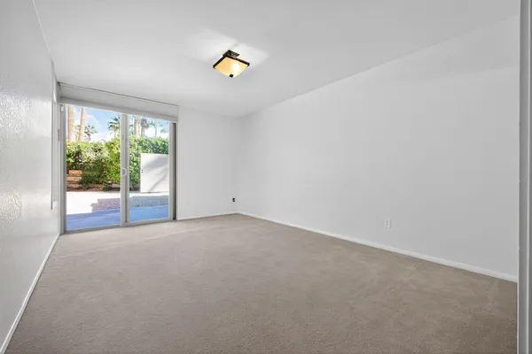 a bed room with a bed and a couch