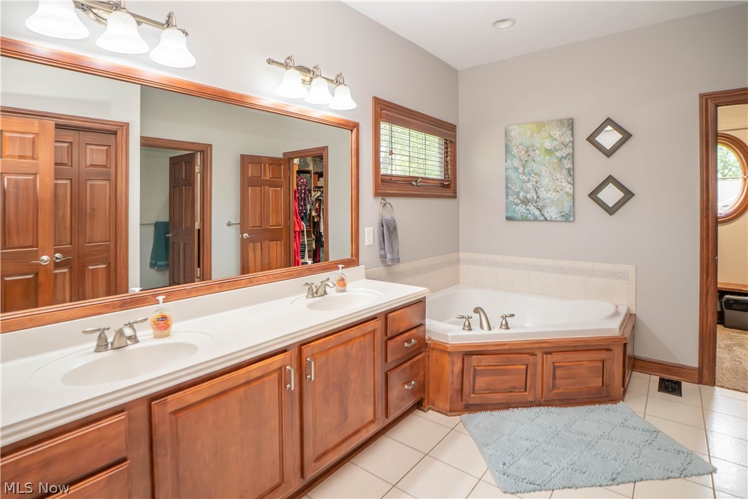 6612 Greyhawk Street Northwest Canton, OH 44708 - Photo 22 of 50 Primary Bathroom with Soaking Tub, Shower and Walk-in Closet
