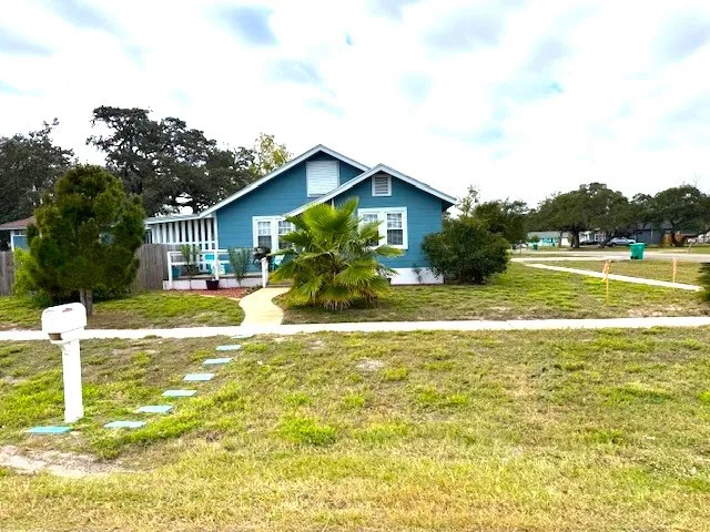 a view of a house with a swimming pool