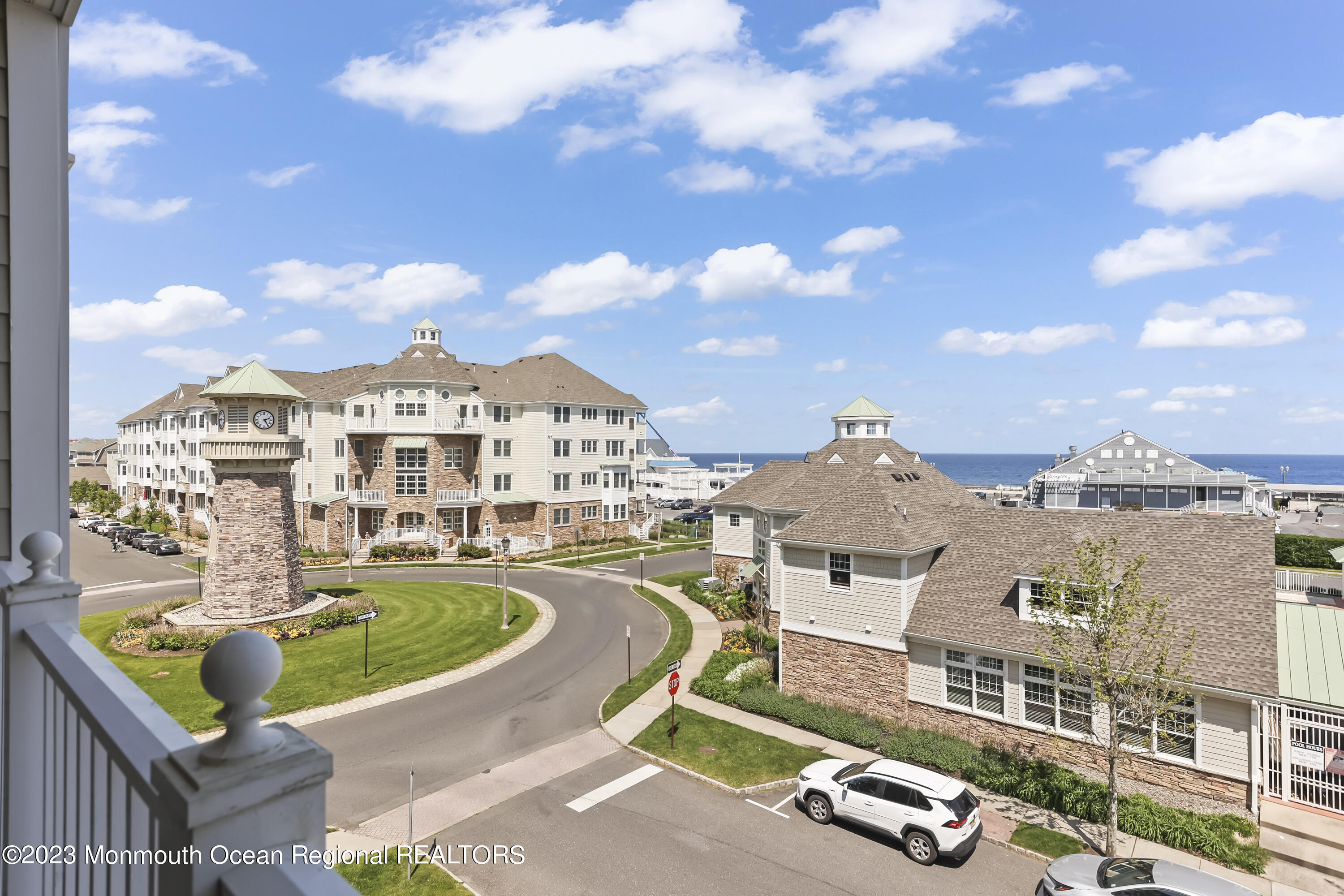 22 Cooper Avenue, Unit 309 Long Branch, NJ 07740 - Photo 1 of 52 aerial view of a house with swimming pool and furniture