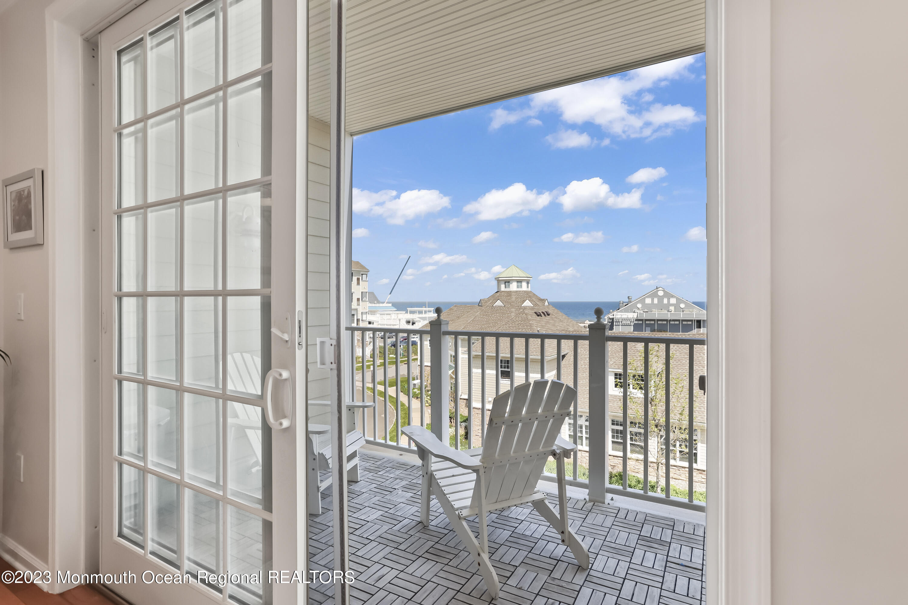 22 Cooper Avenue, Unit 309 Long Branch, NJ 07740 - Photo 23 of 52 a view of a balcony with chair