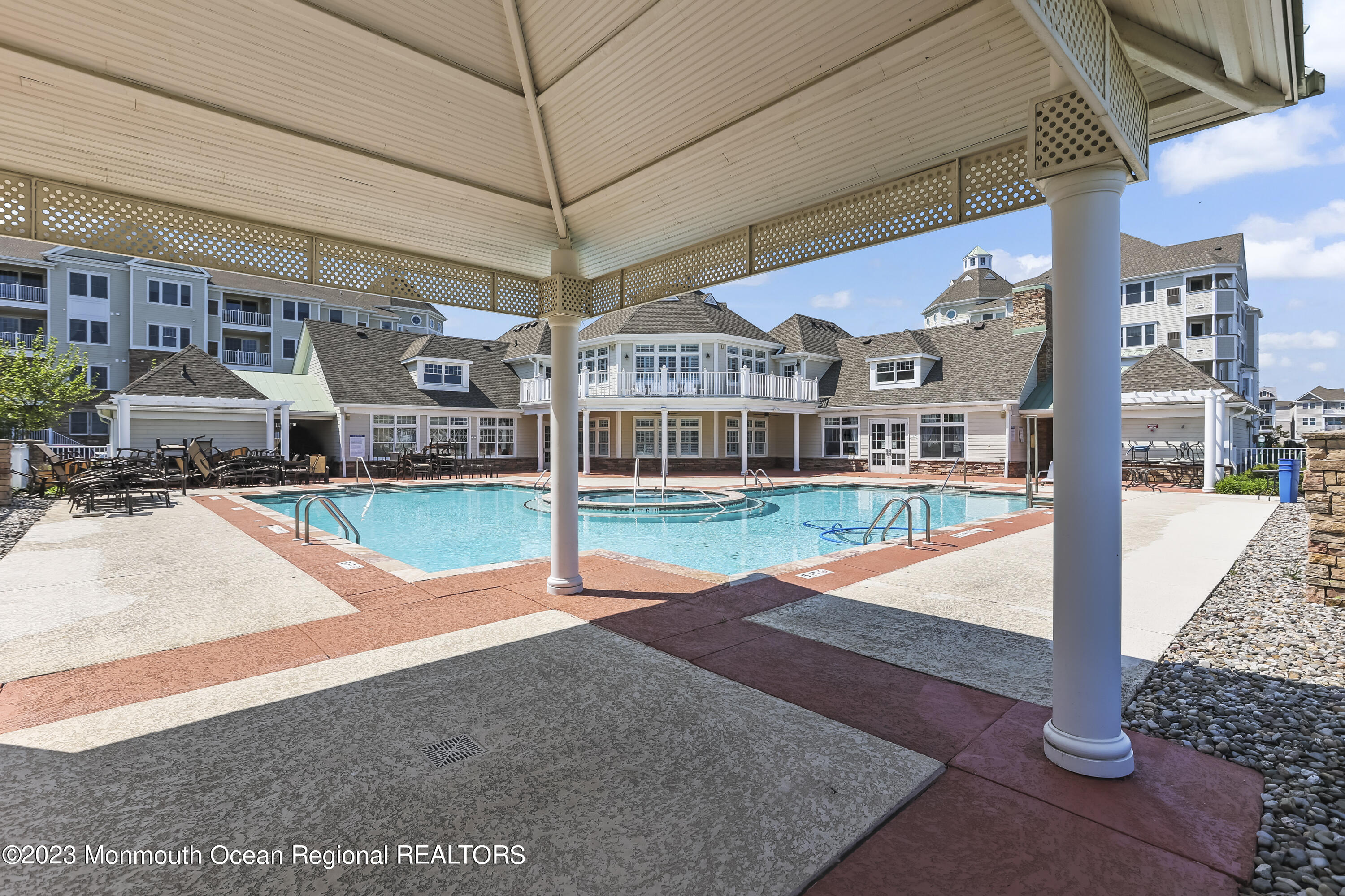 22 Cooper Avenue, Unit 309 Long Branch, NJ 07740 - Photo 26 of 52 a view of a house with a swimming pool