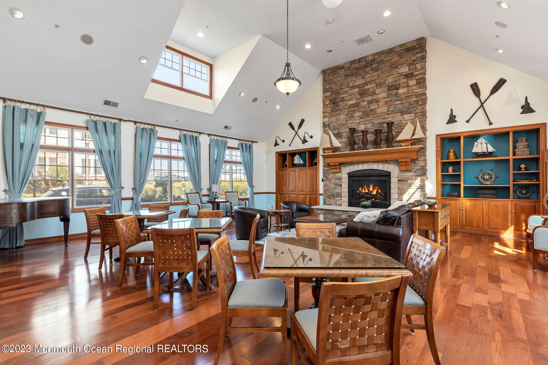 22 Cooper Avenue, Unit 309 Long Branch, NJ 07740 - Photo 29 of 52 a living room with fireplace furniture and a large window