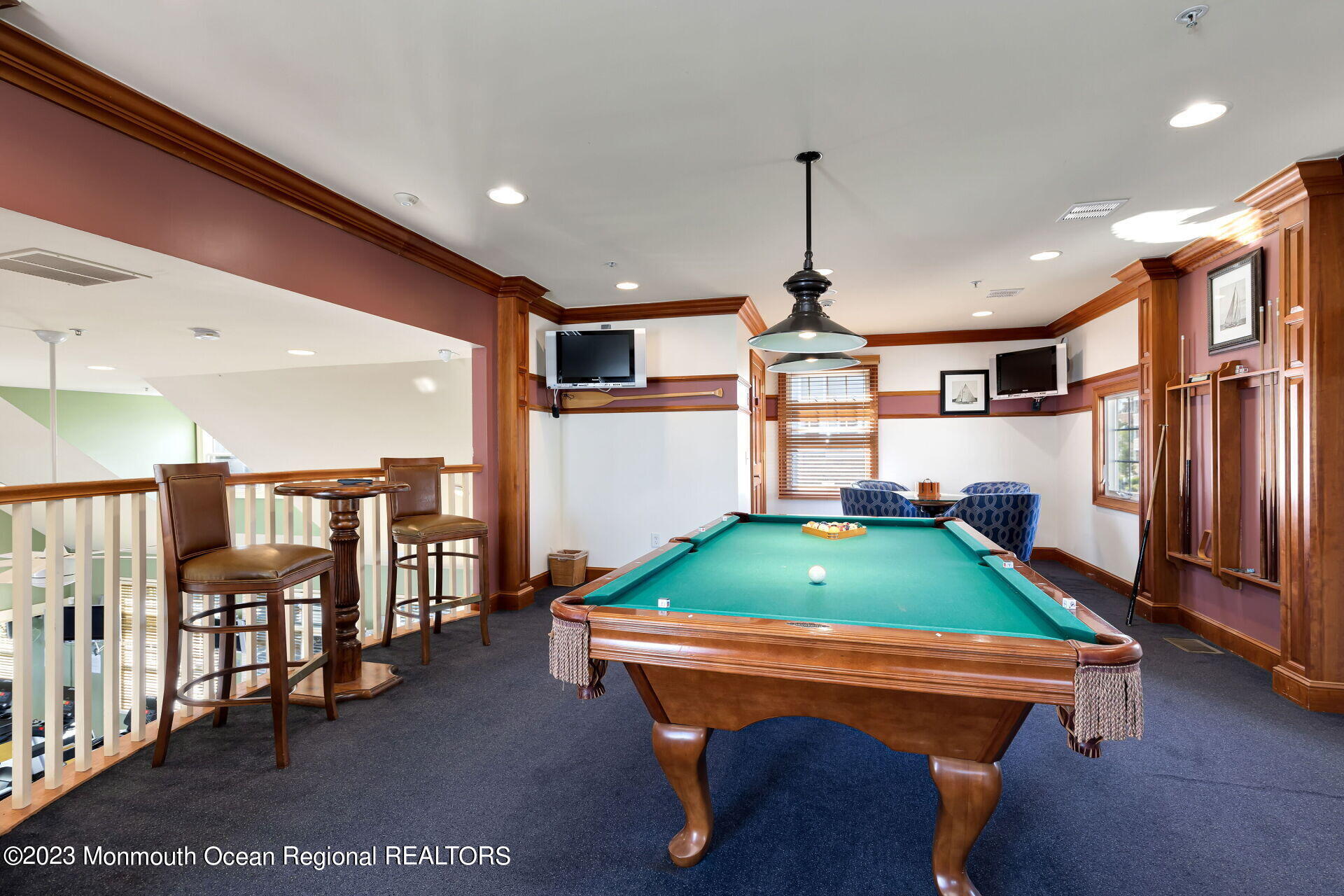 22 Cooper Avenue, Unit 309 Long Branch, NJ 07740 - Photo 33 of 52 a room with lots of furniture and windows
