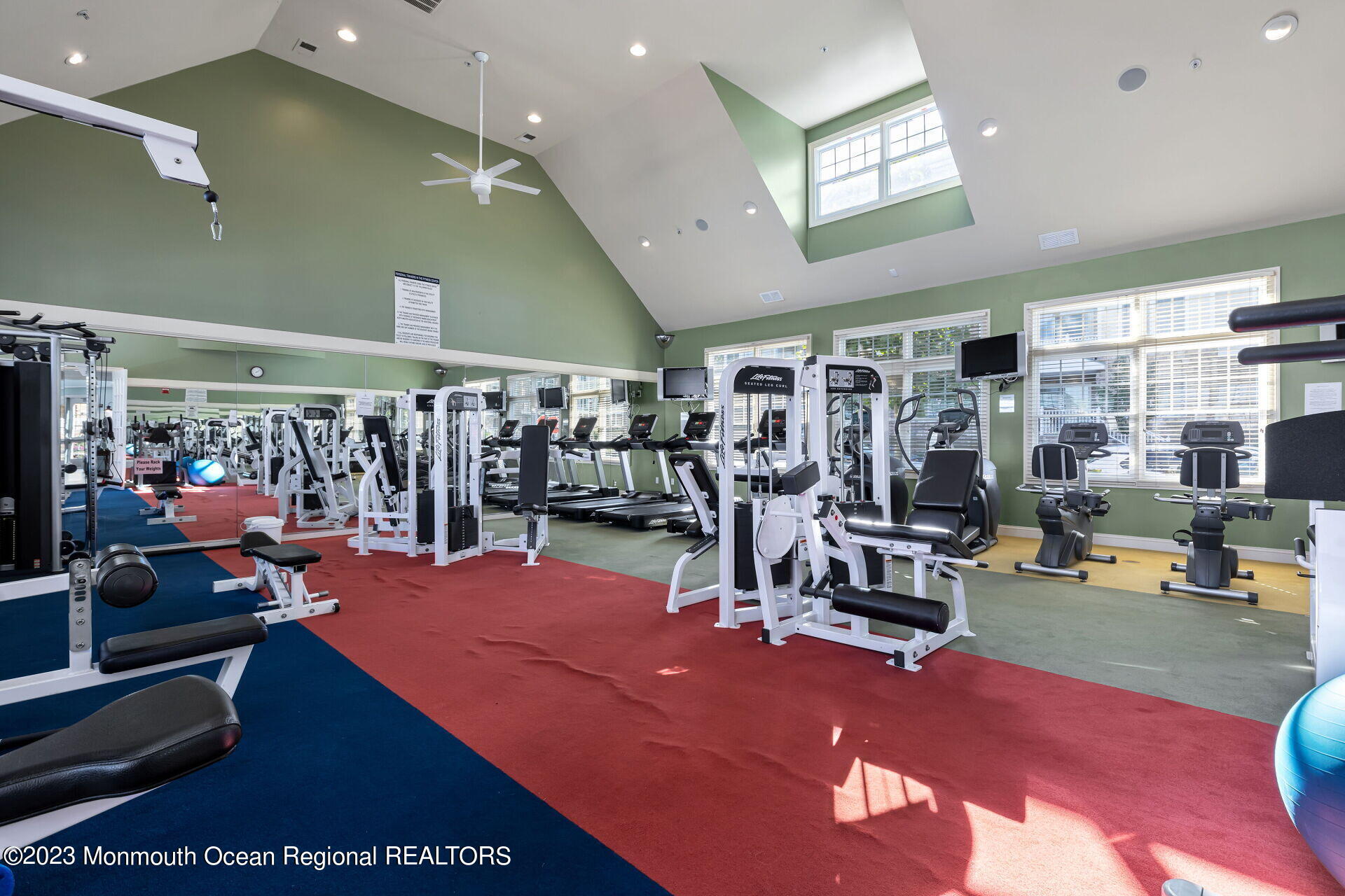 22 Cooper Avenue, Unit 309 Long Branch, NJ 07740 - Photo 34 of 52 a view of a room with gym equipment