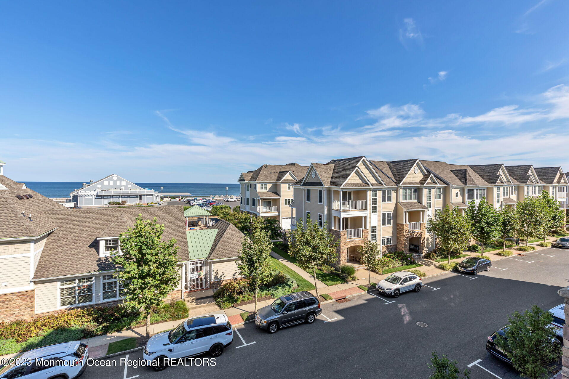 22 Cooper Avenue, Unit 309 Long Branch, NJ 07740 - Photo 36 of 52 a city street lined with parked cars