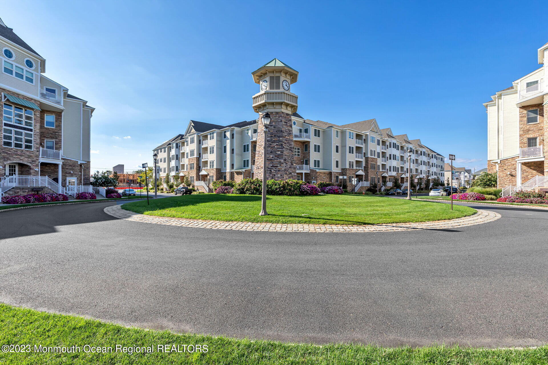 22 Cooper Avenue, Unit 309 Long Branch, NJ 07740 - Photo 38 of 52 a view of a city with tall buildings