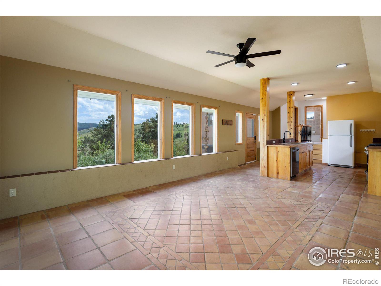 78 Old Post Road Boulder, CO 80302 - Photo 8 of 25 a view of an empty room with a window