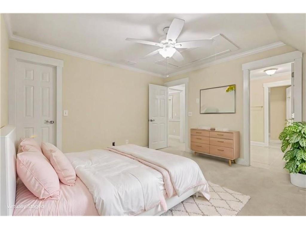 53 Pinto Place Jasper, GA 30143 - Photo 28 of 62 a bedroom with a bed and a chandelier