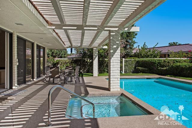 6 Exeter Court Rancho Mirage, CA 92270 - Photo 17 of 20 a view of a swimming pool with a patio